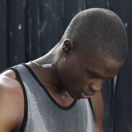 man wearing Sweatproof Earbuds