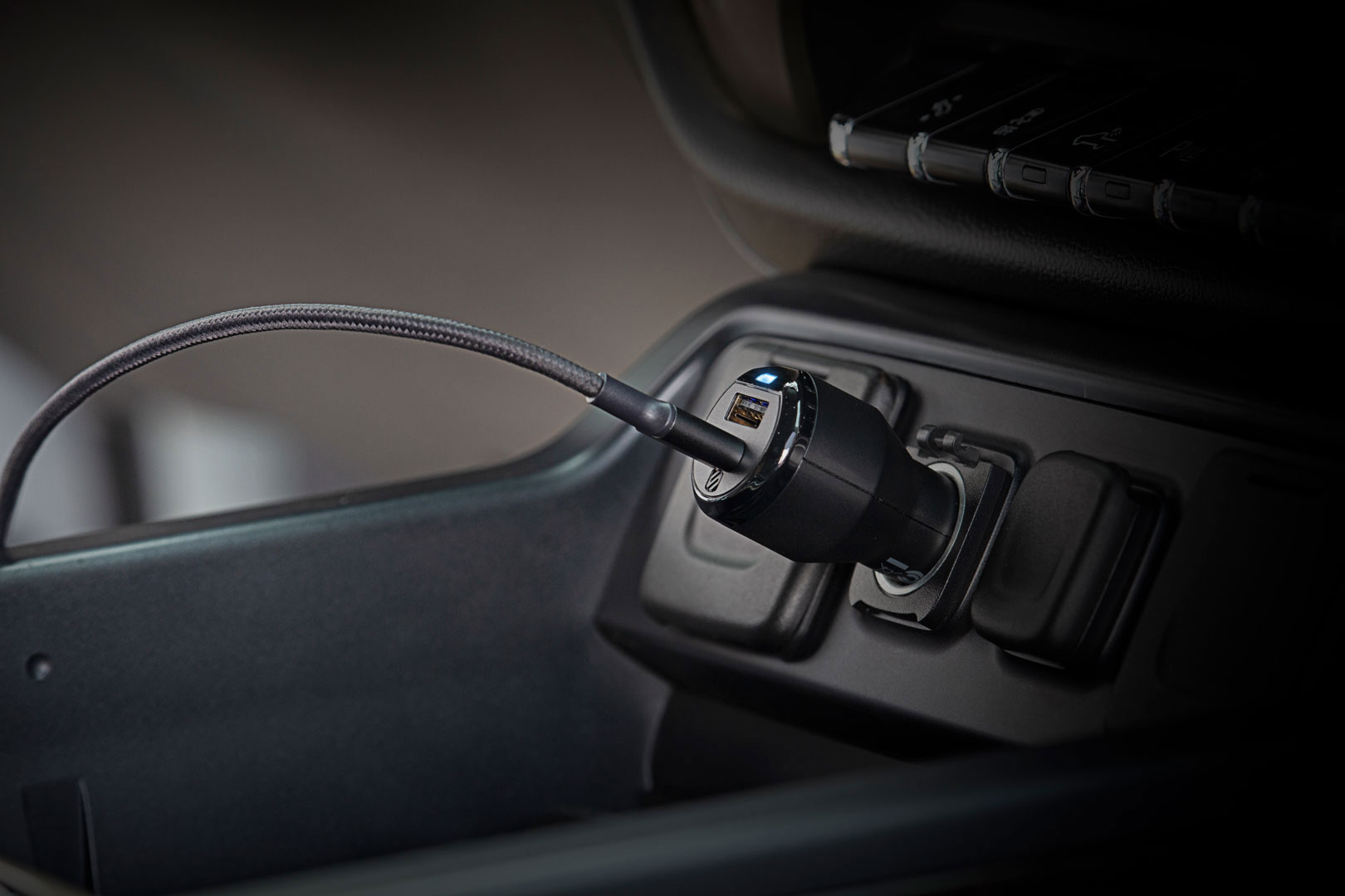 close up of dual port car charger with braided cable