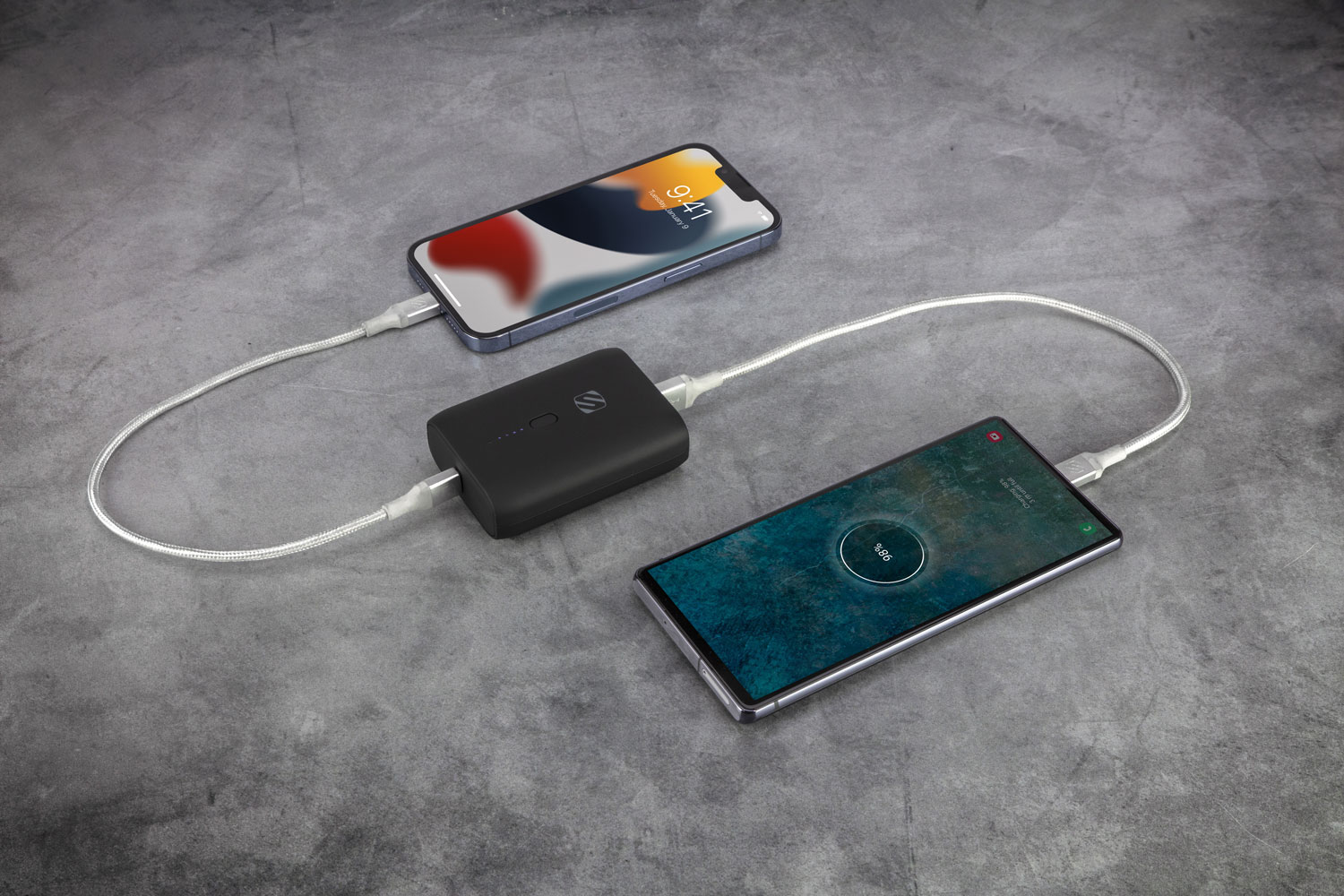 2 phones charging via Scosche poertable power bank and Scosche braided cables