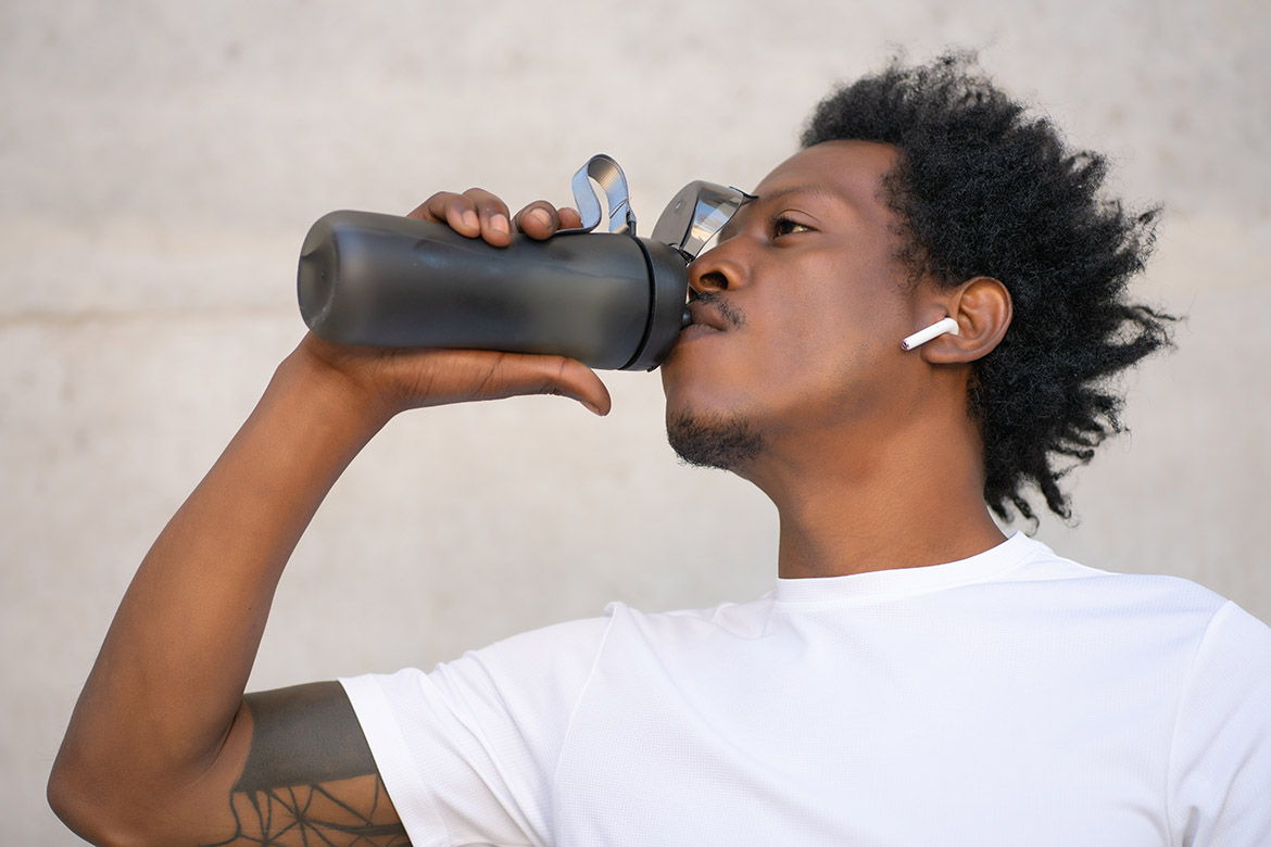 athletic man drinking water athletic man drinking water