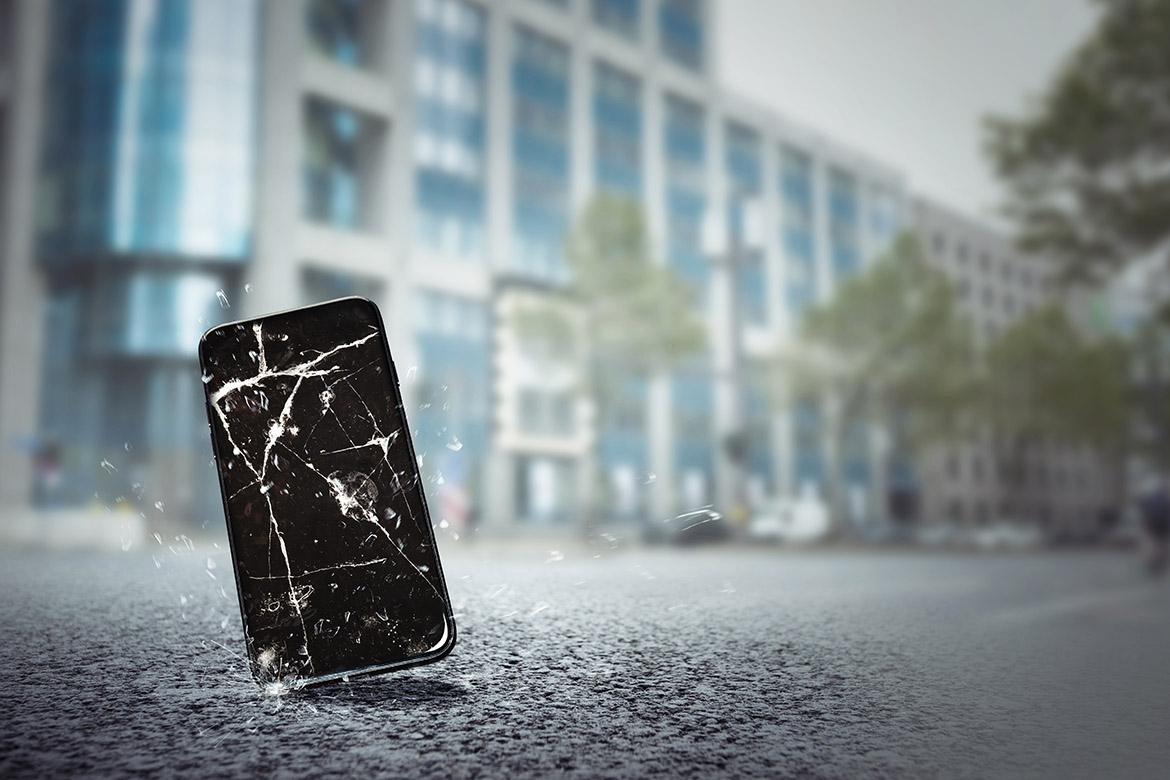 mobile phone falls on the street mobile phone falls on the street and screen is cracked